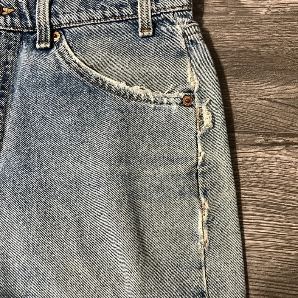 Vintage Levi's 550 Heavily Distressed Light Wash Blue Jean Shorts Size 32x10 USA